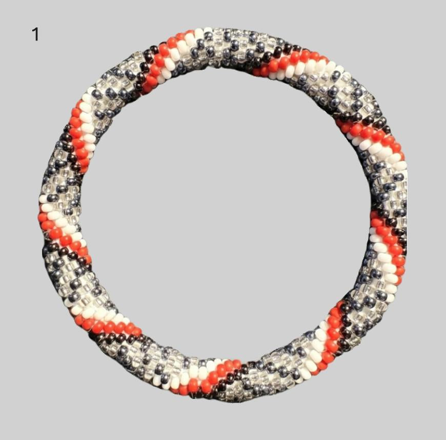 A selection of beaded bracelets from Nepal, handmade in black and red