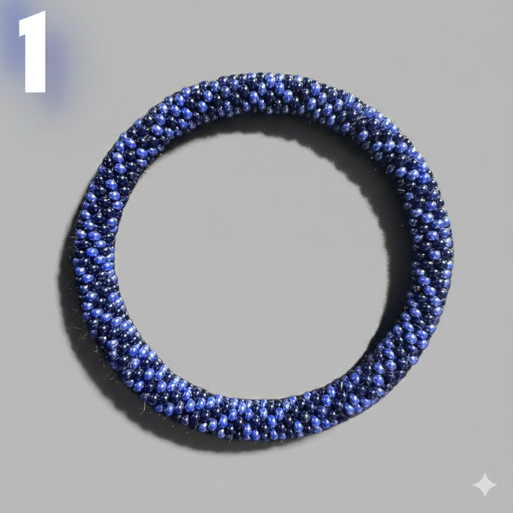 A selection of blue and red beaded hoop bracelets, handmade from Nepal.