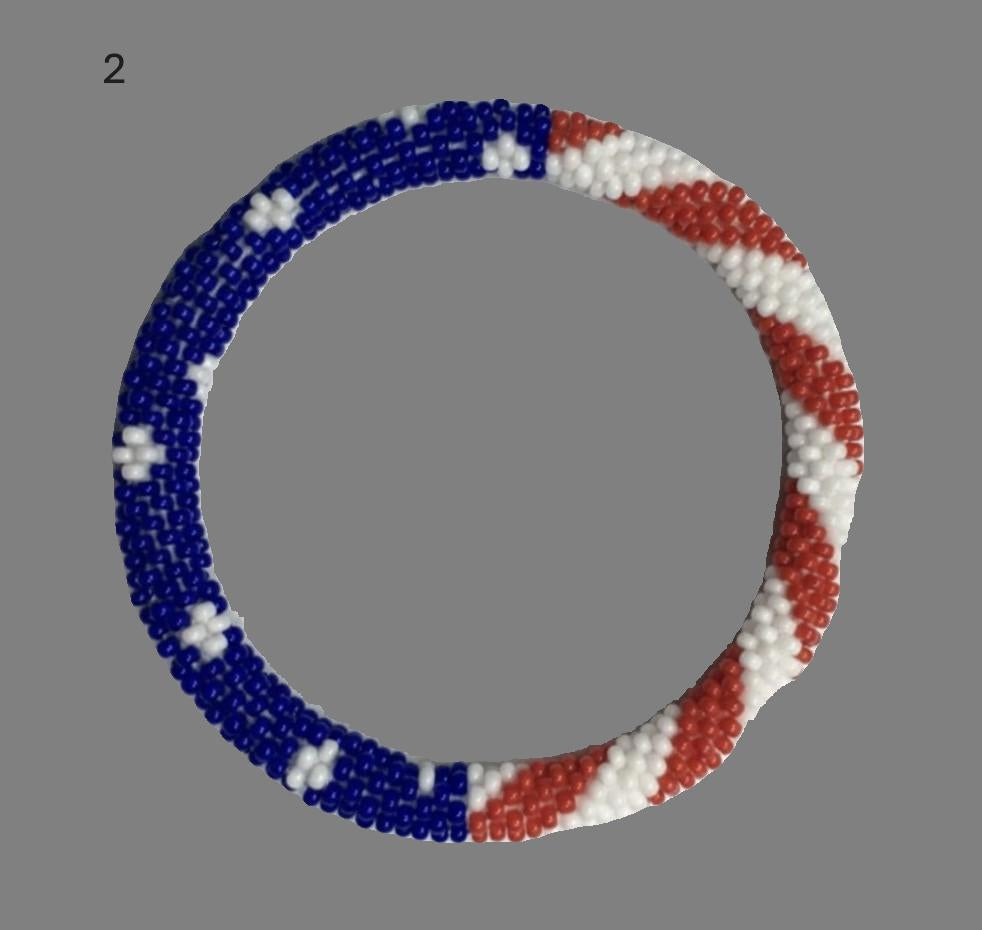 A selection of blue and red beaded hoop bracelets, handmade from Nepal.