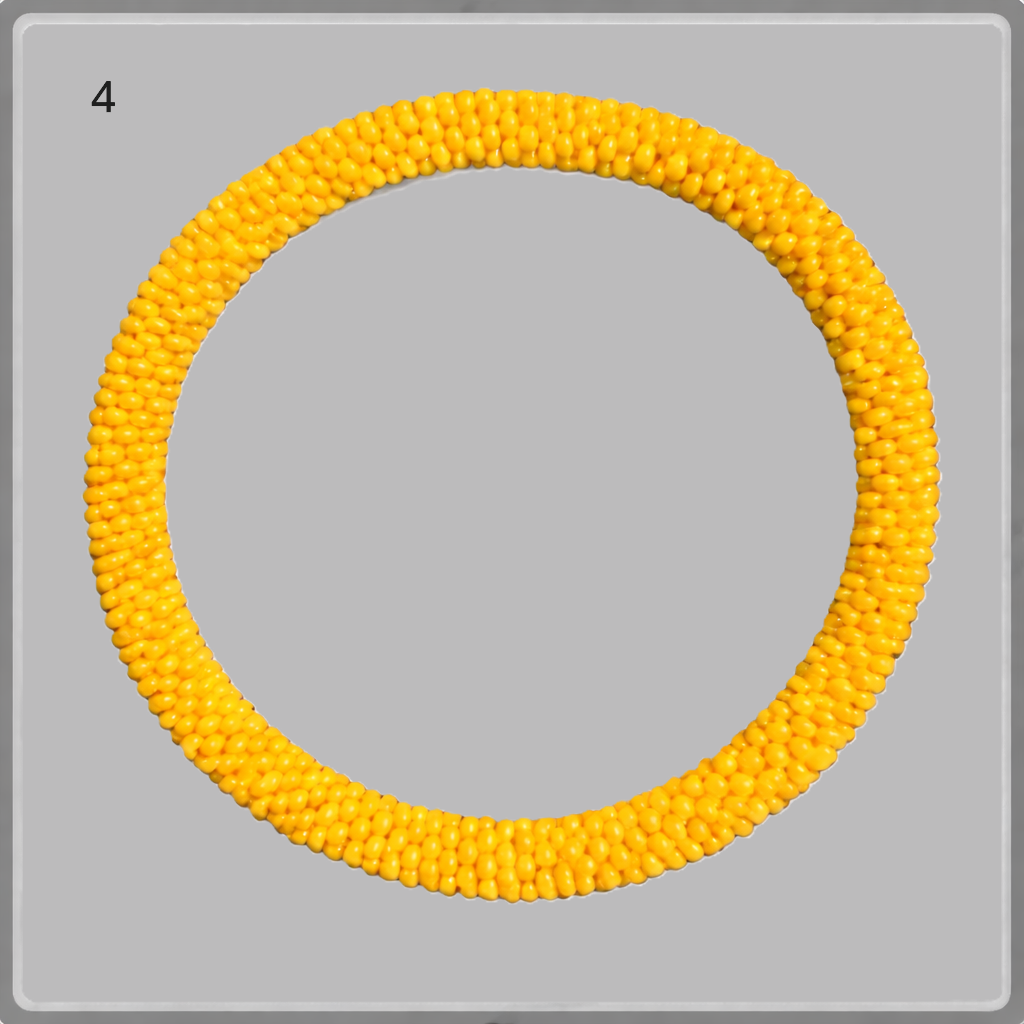 A selection of beaded bracelets from Nepal in orange and light blue 