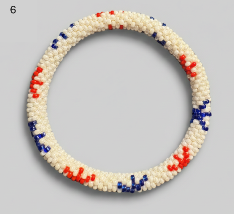A selection of blue and red beaded hoop bracelets, handmade from Nepal.