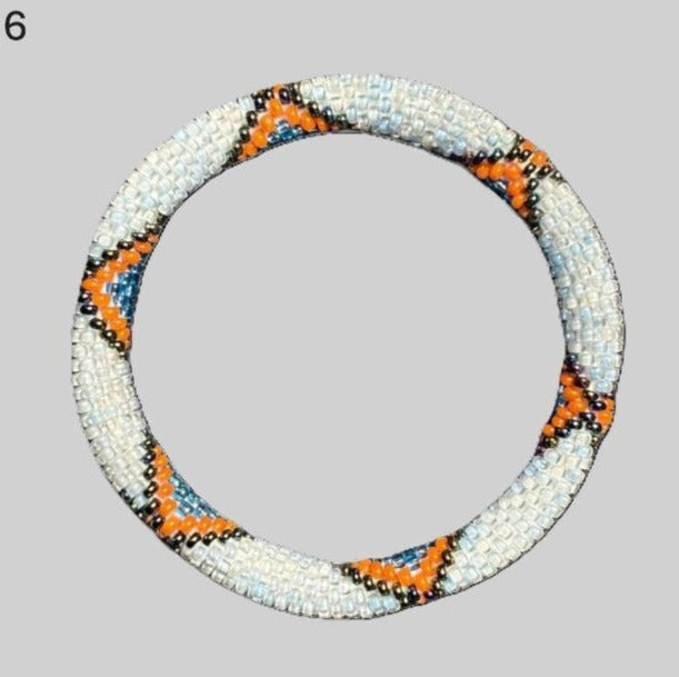 A selection of beaded bracelets from Nepal in orange and light blue 