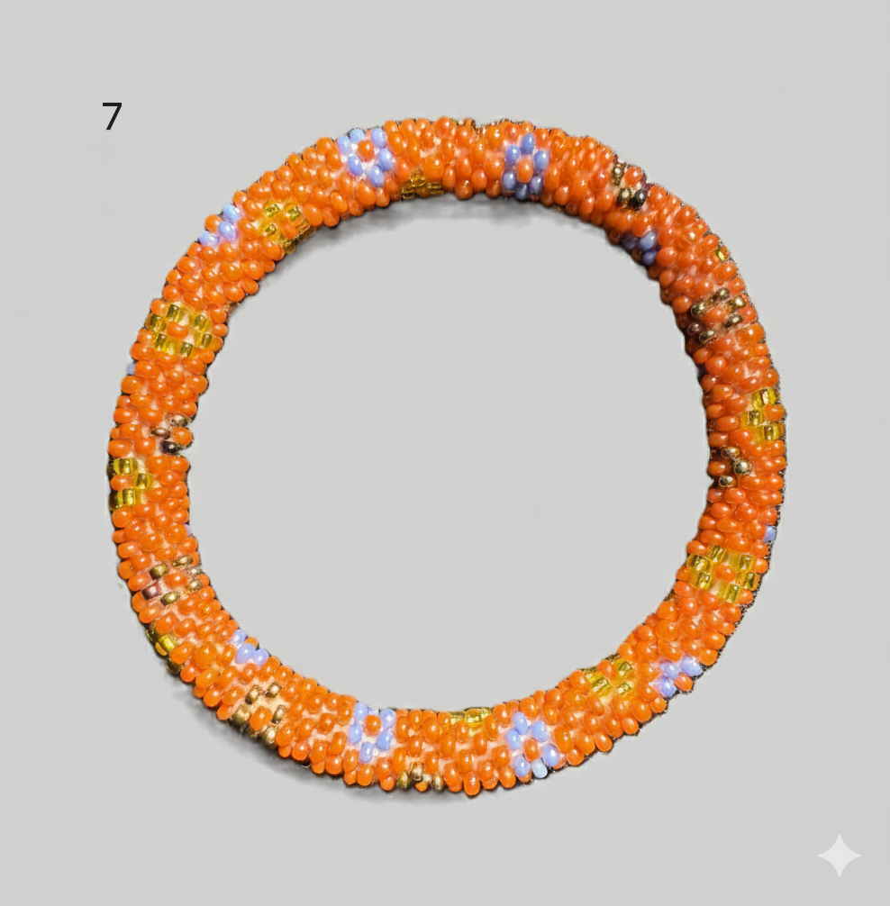 A selection of beaded bracelets from Nepal in orange and light blue 