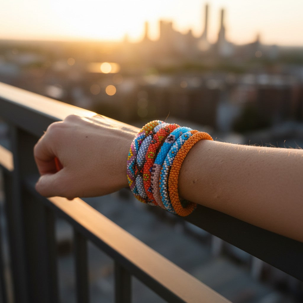A selection of beaded bracelets from Nepal in orange and light blue 